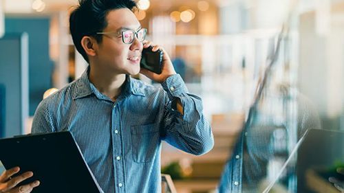 A stock image of someone talking on the phone